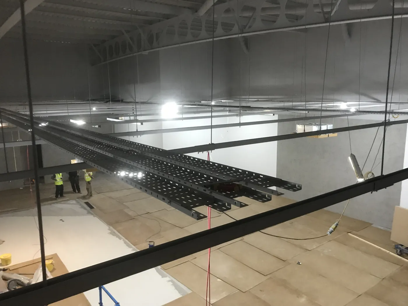 Cable tray installation in a commercial unit by DTF Electrical