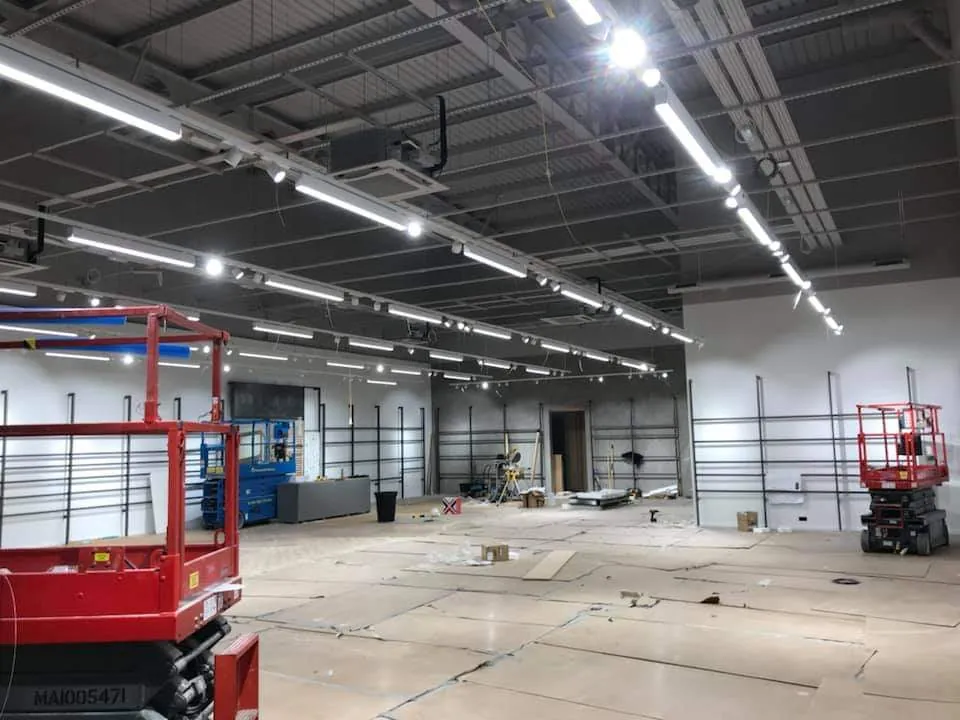 Retail unit electrical fit-out with suspended track lighting by DTF Electrical